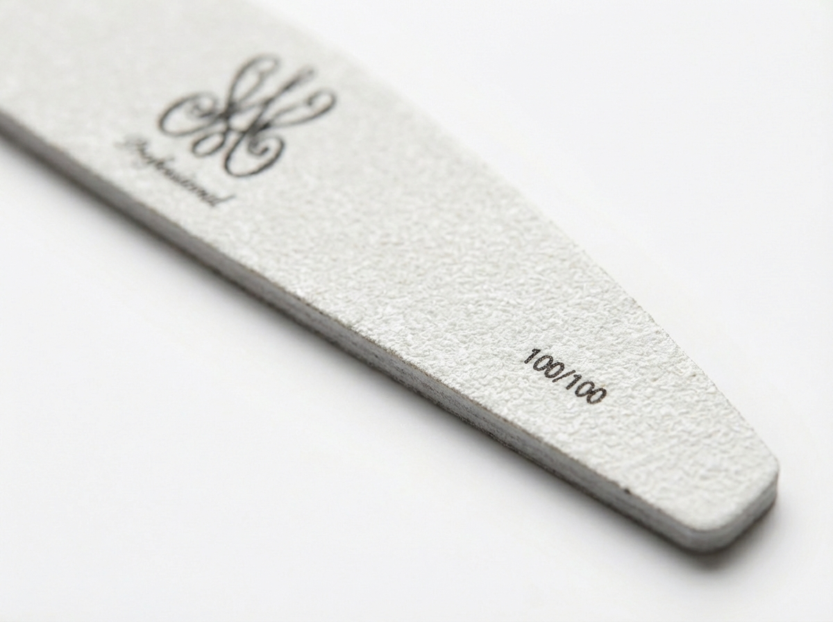 Weiße Halbmond‑Nagelfeile 100/100 für professionelles Abtragen und Formen.